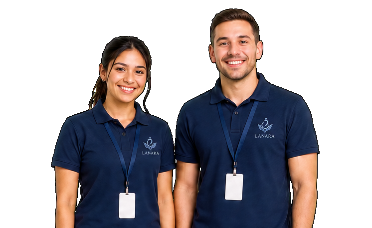 Two Lanara support workers in navy polo shirts with the Lanara logo, smiling confidently